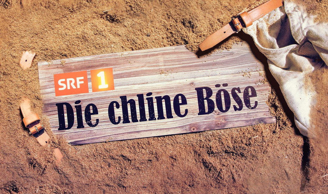 Die chline Böse auf einem Schild im Sand